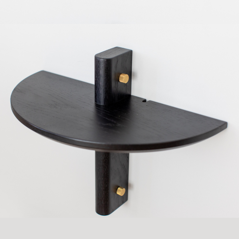 JUT Side Table Round - Oak stained Black with brass fixings and wall mounted  